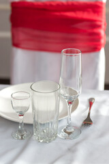 The glasses are empty on the table. Serving a festive banquet.
