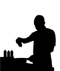 silhouette of bald chef pouring sauce into pan