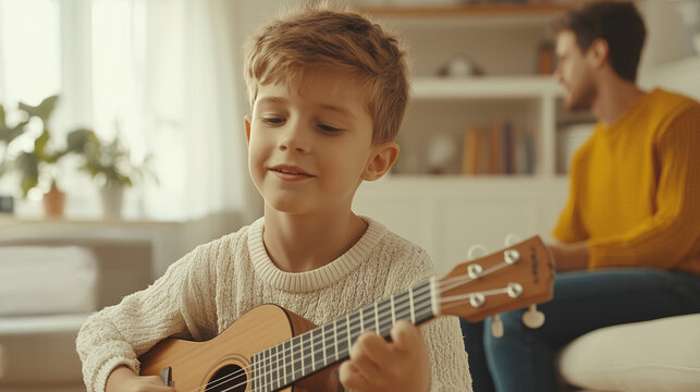 Smiling Boy Playing Ukulele with Father at Home, Enjoying Family Time and Learning Music, Fun Moment with Acoustic Stringed Instrument.