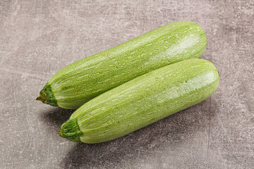 Raw green ripe zucchini vegetable