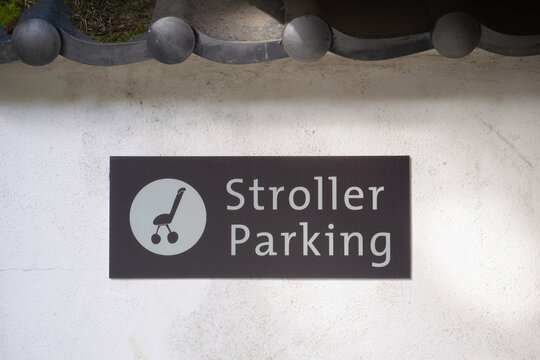 Stroller Parking sign on a white wall, USA