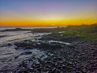 Sunset over the river in city Colony, Uruguay 