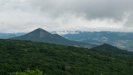 Fototapeta premium Landscape of the Bohemian Central Highlands from Košťálov Castle.