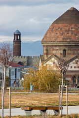 Erzurum Castle clock tower and Emir Saltuk Tomb with a scenic background