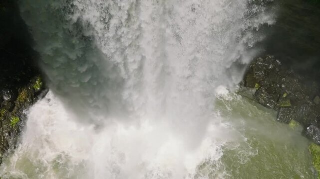 Splash and mist from Hikong Alo Falls in Lake Sebu. Mindanao, Philippines.