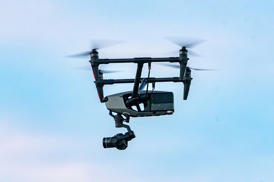 Low angle view of a Drone With Large Video Camera in flight, British Columbia, Canada