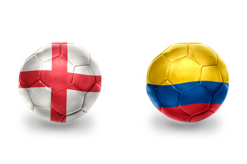 Obraz premium football balls with national flags of england and colombia ,soccer teams. on the white background.