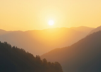 Fototapeta premium Golden sunset illuminating misty mountains over lake