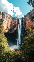 Majestic Waterfall in Lush Green Landscape