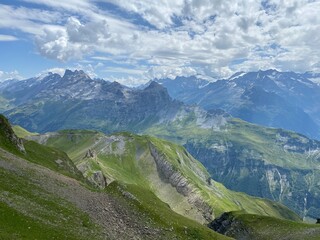 Fototapeta premium View of the Urner Alpen from the peaks above Lake Melchsee or Melch Lake in the Uri Alps mountain massif, Kerns - Canton of Obwald, Switzerland (Kanton Obwalden, Schweiz)