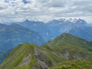 View of the Urner Alpen from the peaks above Lake Melchsee or Melch Lake in the Uri Alps mountain massif, Kerns - Canton of Obwald, Switzerland (Kanton Obwalden, Schweiz)