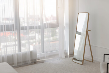 floor mirror in a minimalist style apartment