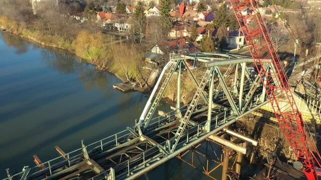 Aerial view on worker as they cutting waste metal of bridge by mixing oxygen and acetylene gas, propane