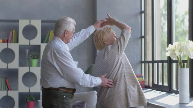 A Joyful Elderly Couple Dancing Together in Their Cozy Home, Filled with Love and Memories