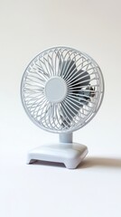 Minimalist White Desk Fan with Clean Design on Plain Background