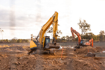 diggers working on getting land ready for a new housing estate near Brisbane