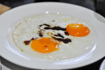 fried egg or sunny side up egg with soy sauce topping