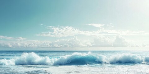 A serene ocean view with gentle waves under a clear sky and soft sunlight.