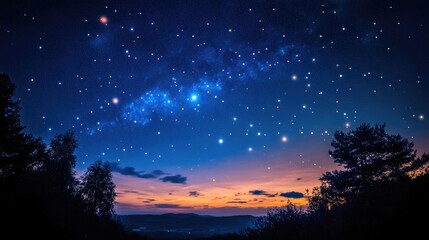 Naklejka premium Stunning Starry Night Sky with a Deep Blue Canvas and Glittering Stars over Silhouetted Trees at Dusk