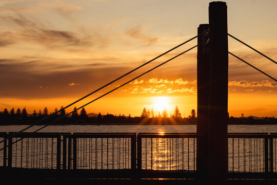 Viewing platform over the barque Adolphe shipwreck on the Stockton breakwall at sunset