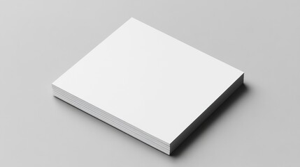 Minimalistic blank white flyer stacked on a subtle grey background, showcasing a clean and simple design ideal for customization or promotional use.