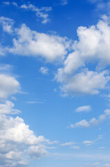 Naklejka premium White clouds in blue sky