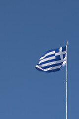 Fototapeta premium Greek National Flag Against Clear Sky