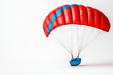 Obraz premium Vibrant Red Parachute on White Background