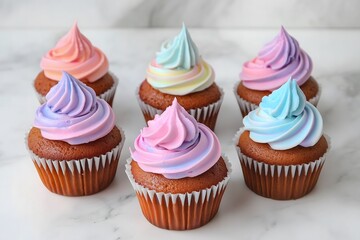 Six cupcakes with multiclored frosting
