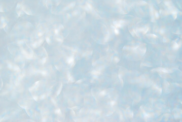 Soft blue sparkle bokeh effect background, silver sparkle lights or background