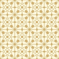 geometric seamless pattern in gold color for textile, carpet, wallpaper and fabric