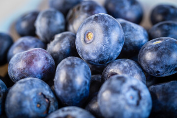 Macro of fresh blueberry berries. Blueberries close-up. Vaccinium myrtillus.