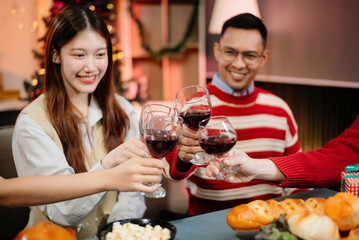 Enjoy the holiday spirit with a joyful Christmas celebration featuring friends, festive food, Santa hats,