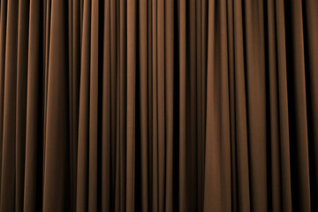 Medium tone brown curtain with many folds background texture
