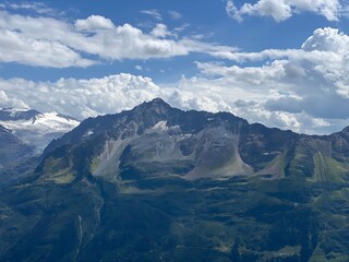 Beautiful photogenic clouds over the Uri Alps massif in the Swiss Alps, Melchtal - Canton of Obwald, Switzerland (Kanton Obwalden, Schweiz)