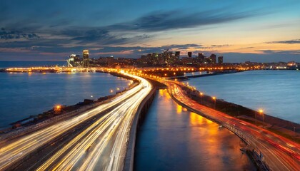 Naklejka premium A captivating scene of evening rush hour: motion blur streaks across a bustling urban highway with shimmering headlights and tail lights, framed by a vibrant city skyline under a twilight