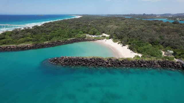 Aerial View Of Marlo's Beach, Seawall And Tweed River In NSW, Australia.