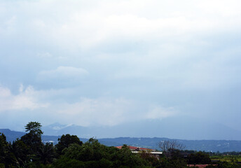 the sky before the heavy rain poured down on the surface of the earth, the blue color slowly...