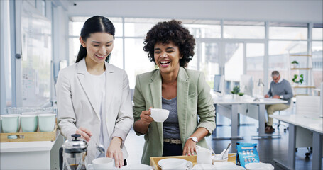 Happy women, coffee break and office with talk, relax and comfort for conversation in business. Female people, laugh and drinking tea for lunch in kitchen, accounting firm or company for hot beverage