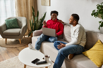 A happy couple enjoys quality time together in their cozy living room on a winter day.