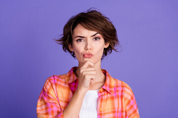Portrait of nice young lady arm touch chin think wear shirt isolated on purple color background