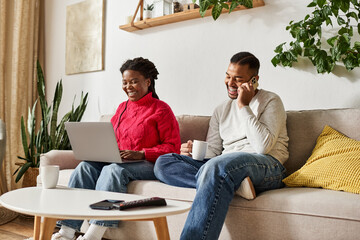 A happy couple shares a warm moment at home, engaged in cozy activities on a winter day.