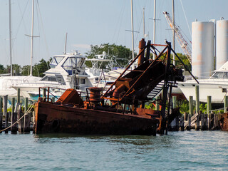 Fototapeta premium old abandoned rusted ship in harbor port of greenport long island new york
