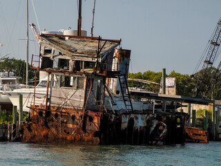 old abandoned rusted ship in harbor port of greenport long island new york