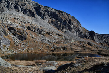 The small and colorful lake of Valfredda, in Val d'Ayas