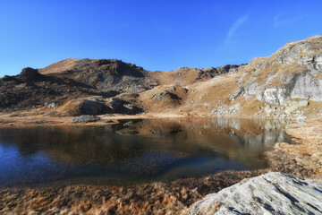 The small and colorful lake of Valfredda, in Val d'Ayas