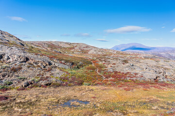 Obraz premium Hills and mountains on the Arctic Circle Trail which links Kangerlussuaq and Sisimiut, Greenland