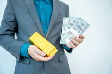 Gold bar stock photo, picture and photo on black table at night.