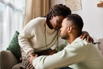 Fototapeta premium A happy couple enjoys tender moments together, embracing warmth and love this winter.