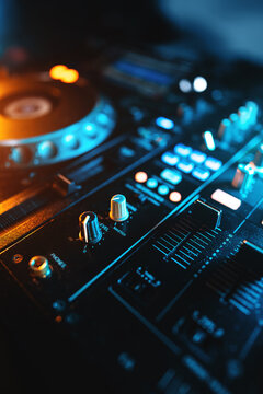 closeup of professional digital pioneer dj decks and audio mixer equipment ready for party in nightclub